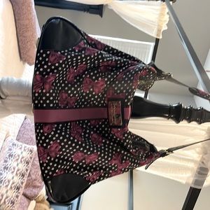 Betsy Johnson large travel tote. Black with white polka dots and pink bows.